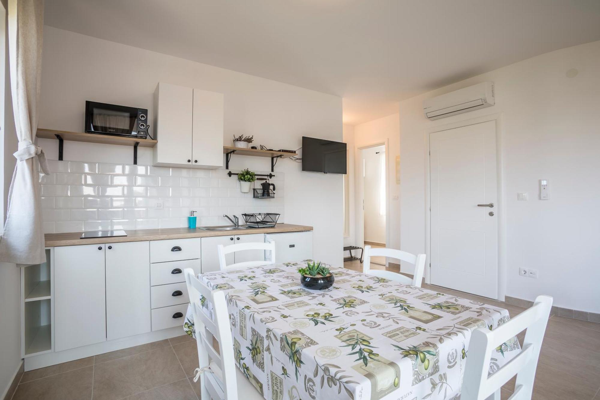 Apartmani Mariela Maslinica Rom bilde